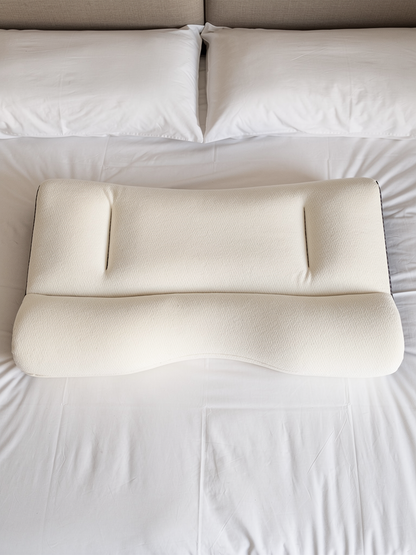 Almohada ComfortSleep doble altura vista cenital sobre cama matrimonio espanola